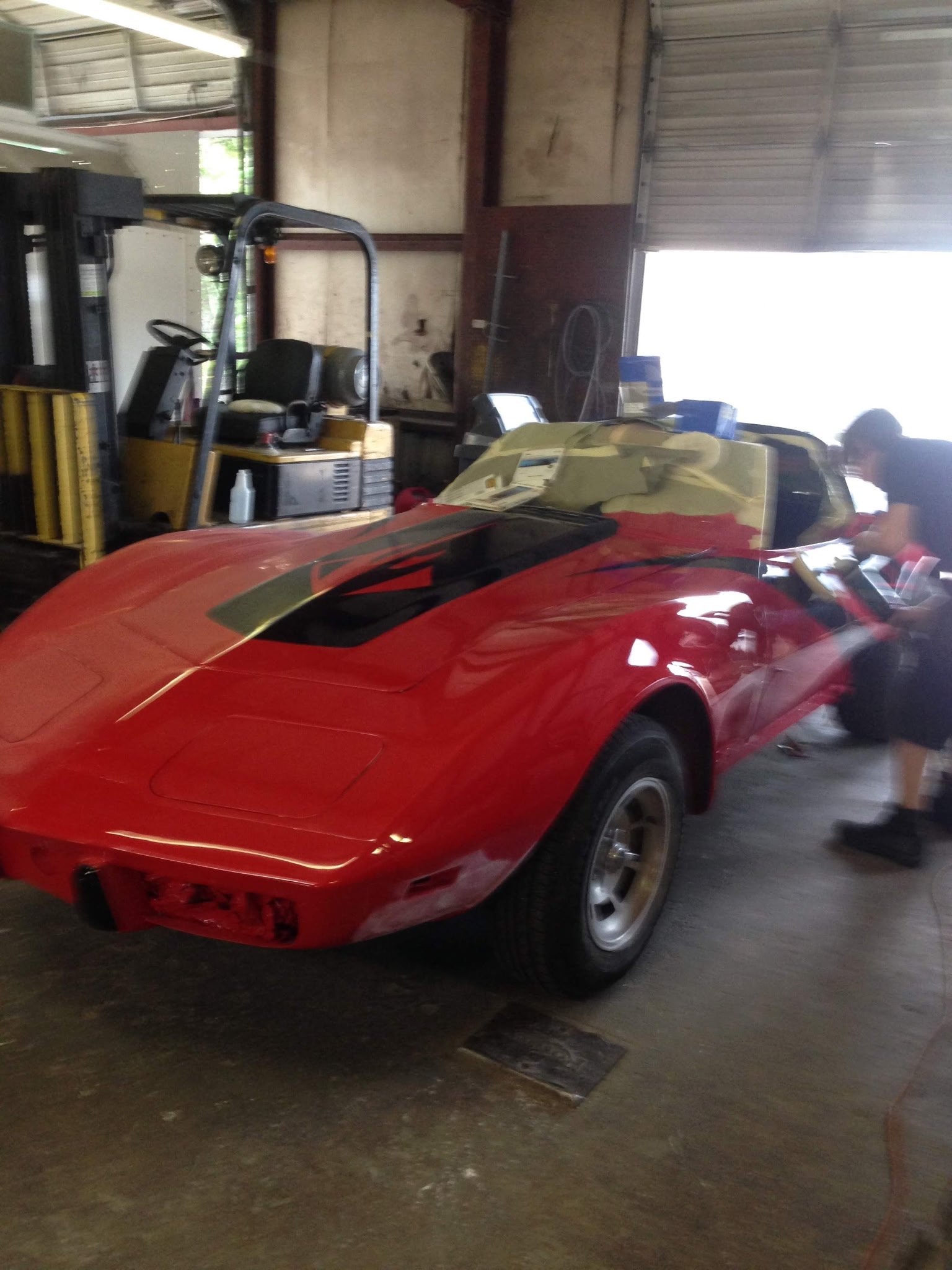 Red Corvette being worked on at Expert Collision LLC